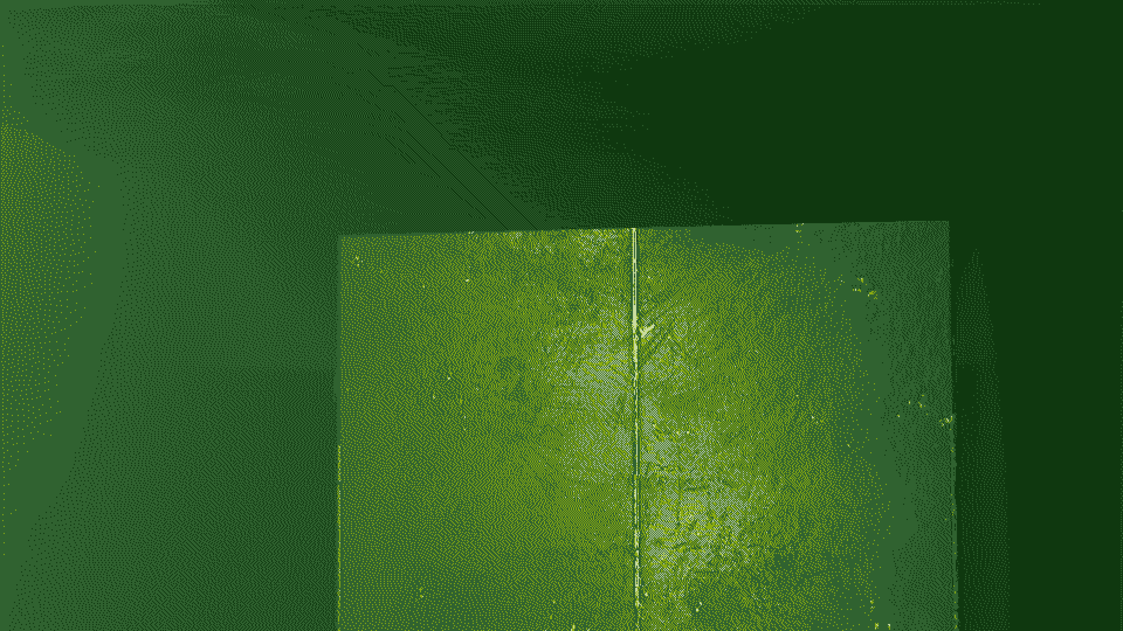 Standing on the sloped roof, looking down its length toward a seam